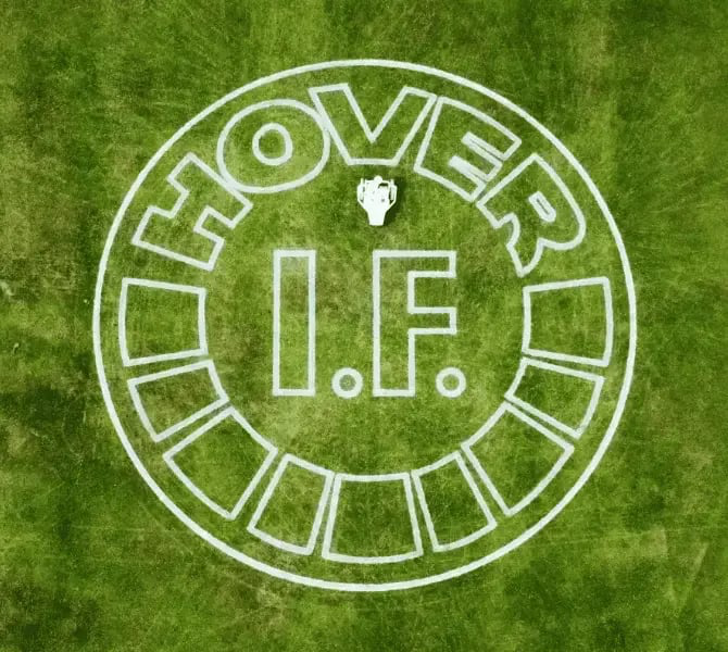 Robotic field marking of a large custom logo painted on an athletic field.